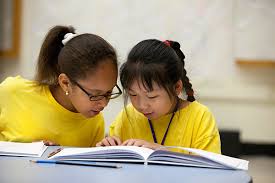 two girls reading