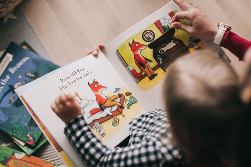 child reading book